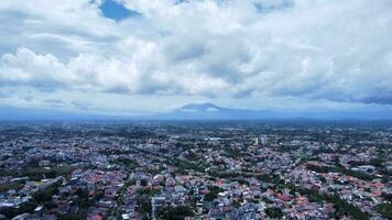 black clouds over the city sky photo