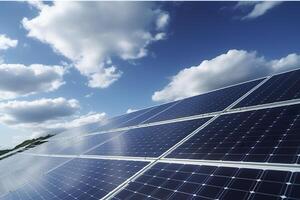 Solar panels under the background of blue sky and white clouds. photo