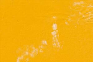 Rough yellow paper texture background photo