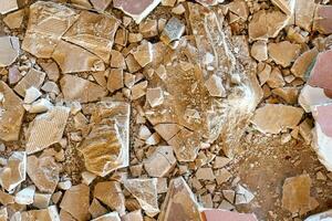 Construction debris and broken tiles. Abstract grunge background. photo