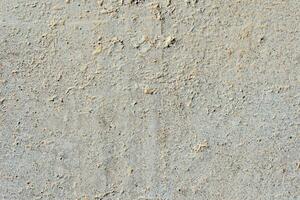 abstract rough wall background with patches of swollen surface photo