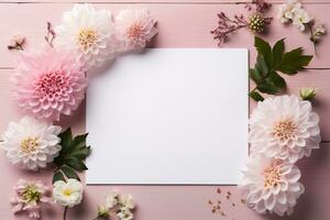 mockup white blank card on pink background surrounded by white and pink dahlia flowers. generated ai photo