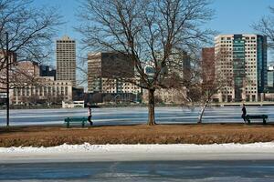 Boston, MA, USA January 10 2010   The frozen Charles River in winter time that separates Boston from Cambridge, MA photo