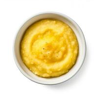 Polenta Porridge cooked top view isolated on white background photo