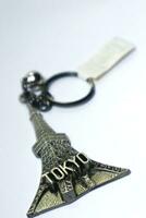 Isolated white from a Tokyo tower key chain with Tokyo writing photo