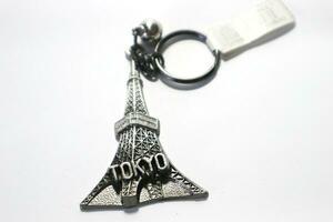 Isolated white from a Tokyo tower key chain with Tokyo writing photo