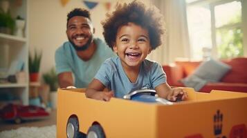 Father, son and playing at home with pretend car in a box on moving day in new property photo