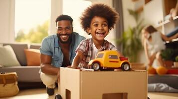 Father, son and playing at home with pretend car in a box on moving day in new property photo