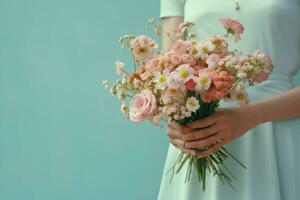 Woman holding flower bouquet photo