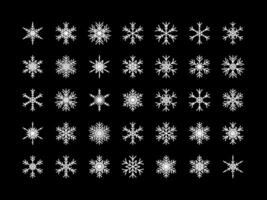 Vector set of different snowflake icon on black background