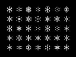 Vector set of different snowflake icon on black background