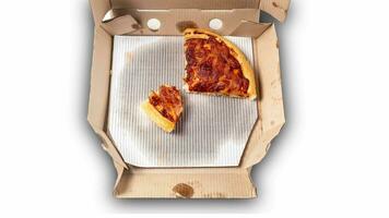 Stop-motion animation of eating a delicious corn pizza in a cardboard box on a white background. video