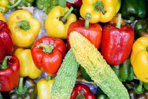 Colorful bell peppers and gourd wallpaper. photo