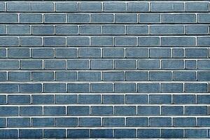 blue wall build of blue bricks photo