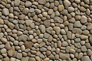 A sidewalk of small stones. Fine pebble texture. photo