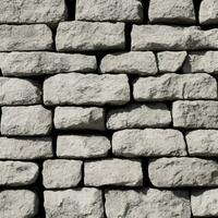 old stone wall  hand craft manufacture rock white wall texture background photo