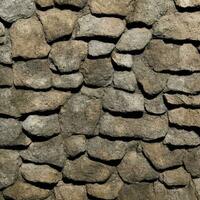 Background of an ancient empty wall made out of stones. photo