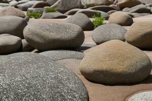 many large round stones of different sizes close-up photo