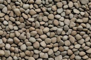 Small round stones background. Stone texture. Rough surface of small pebble stone. photo