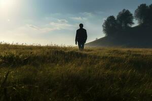 Man in field in sunny day photo