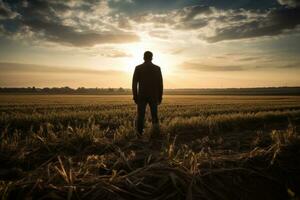 Man in field in sunny day photo