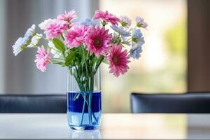 Flowers bouquet in glass vase photo