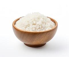 Basmati rice groats in a wooden bowl isolated created with Generative AI technology photo