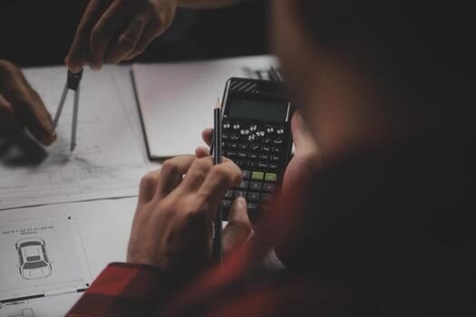 Engineer Teamwork Meeting, Drawing working on blueprint meeting for project working with partner on model building and engineering tools in working site, Construction and structure concept. photo