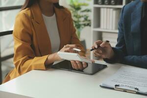 Financial Business team present. Business man hands hold documents with financial statistic stock photo, discussion, and analysis report data the charts and graphs. Finance Financial concept photo