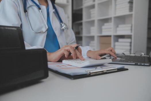 Professional lab. Amazing longhaired medical worker wearing uniform while using microscope during research photo