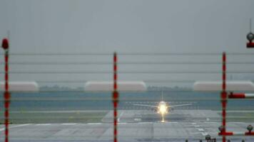 Jet airplane accelerate before departure at rainy weather. Dusseldorf airport video