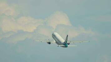 PHUKET, THAILAND NOVEMBER 26, 2019 - SilkAir Airbus 320 departure from Phuket airport, cloudy sky background. View from the top floor of the Splash Beach Resort hotel, Phuket, Thailand video