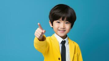 asian boy pointing finger at copy space in studio shot created with Generative Al technology. photo