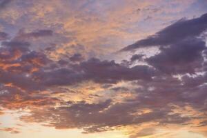 Sunset evening and red-blue clouds in the sky. Beautiful clouds in the evening. photo