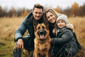 Happy family with dog photo