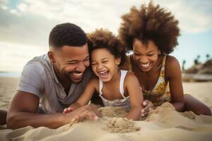 Happy family on the beach photo