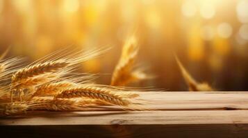 Wooden table with wheat field background photo