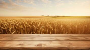 Wooden table with wheat field background photo