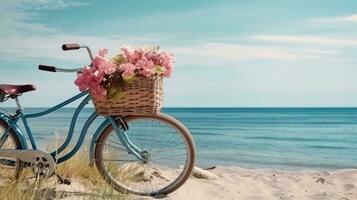 Bicycle with a basket sits on top of sand near the ocean photo