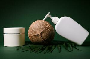 Shower gel with coconut, moisturizing body milk or lotion in a white mockup bottle with a dispenser on green background photo