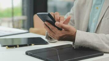 Financial analysts analyze business financial reports on a digital tablet planning investment project during a discussion at a meeting of corporate showing the results of their successful teamwork. video