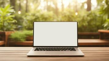 Natural background with laptop with empty screen photo