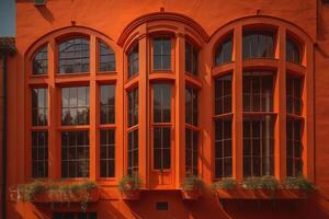 Beautiful windows of a building with orange walls and green plants. generative ai photo