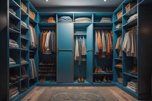 Closet with clothes and shoes in modern dressing room. photo