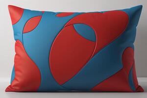 a red pillow with a blue pattern on it. photo