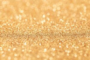 Gold glitter abstract background texture. Full frame. Selective focus photo