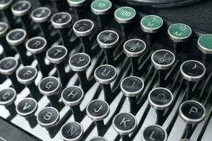 Close up view of an old typewriter keys. Selective focus photo
