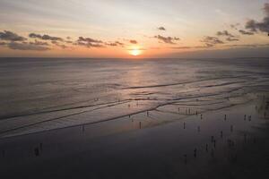 Aerial view of kuta beach at Badung Regency, southern Bali, Indonesia. photo