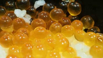 Close up of sashimi salmon roe with rice bowl or donburi in Japanese style food. photo