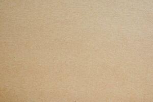Old Kraft paper craft vintage pattern. brown recycled paper texture background photo
